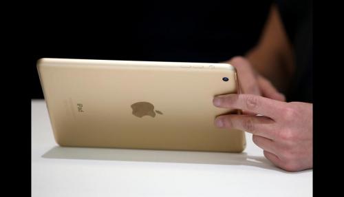 iPad mini 4 dorada con blanco lector de hue - Imagen 1