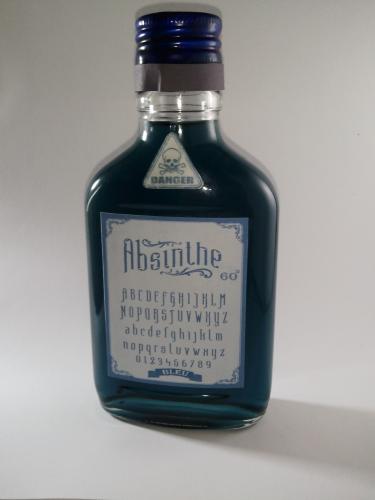 Licor de ajenjo (absinthe) embotellado y ela - Imagen 1